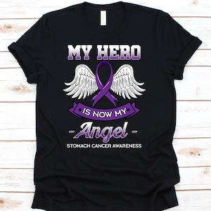 Meu herói é agora meu anjo camisa, presente de conscientização do câncer para o sobrevivente do lutador guerreiro do câncer de estômago, camiseta com fita de câncer de estômago