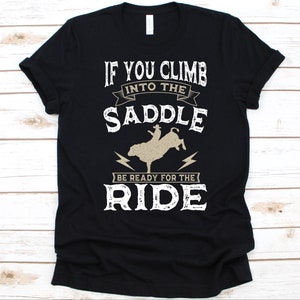 If You Climb Into The Saddle Shirt, Bull Riding Design, Rodeo Lovers, Bull Rider Gift, Cowboy Graphic, Equestrian Sport, Steer Wrestler