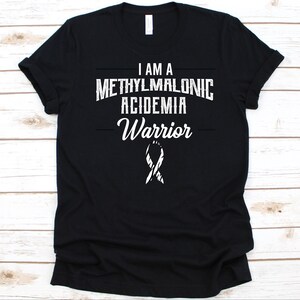 I Am A Methylmalonic Acidemia Warrior Shirt, MMA Fighter Gift, Methylmalonic Aciduria, Zebra Stripes Awareness Ribbon, Metabolic Disorder