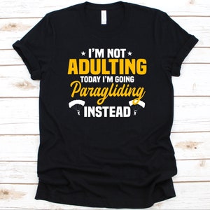 I&#39;m Not Adulting Today I&#39;m Going Paragliding Shirt, Gift For Paragliders, Paragliding Lovers, Parasailing Graphic, Flying Sports T-Shirt