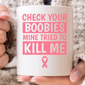 Check Your Boobies Mine Tried To Kill Me Mug, Cancer Awareness Coffee Cup For Breast Cancer Patients Survivor, Cute Pink Ribbon Mug Gift