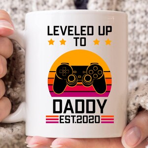 Leveled Up To Daddy Mug, Gaming Baby Announcement Coffee Cup For Soon To Be Daddy, Cute Video Game Gift For Gamer Dad, Gamer Daddy Mug