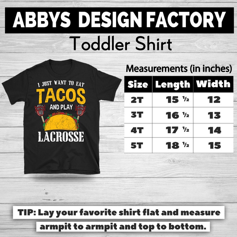 May include: Black toddler shirt with the text "I just want to eat tacos and play lacrosse." The shirt features a taco and lacrosse sticks graphic. Measurements are provided in inches for sizes 2T to 5T.