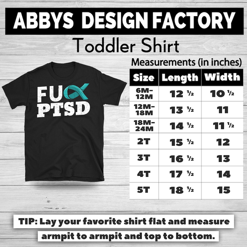 May include: Black toddler shirt with the text "FUX PTSD" in white, with a teal ribbon graphic. The shirt has a size chart with measurements in inches. The shirt is from Abbys Design Factory.