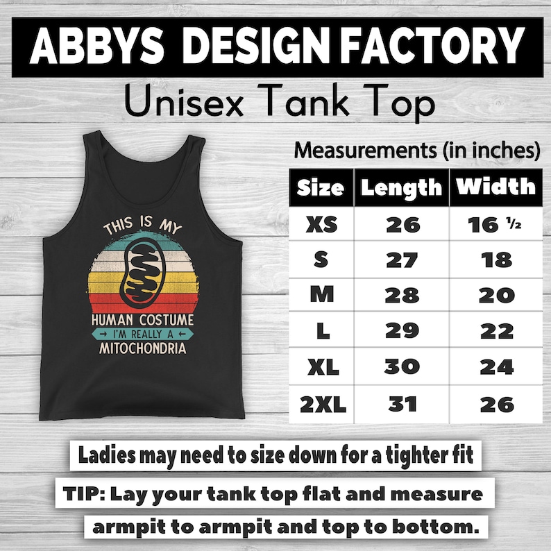 May include: Black unisex tank top with a retro design. The shirt features the text "THIS IS MY HUMAN COSTUME - I'M REALLY A MITOCHONDRIA" with a colorful illustration. Measurements are provided in inches, with lengths ranging from 26 to 31 inches.