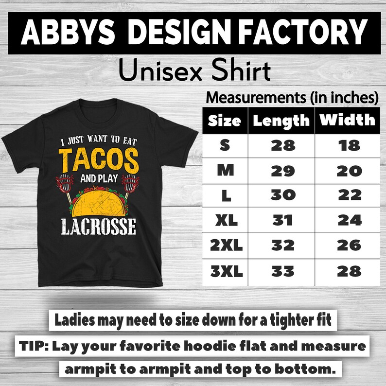 May include: Black unisex t-shirt with the text "I just want to eat tacos and play lacrosse." The shirt includes a graphic of a taco and lacrosse sticks. Measurements are provided in inches for various sizes.