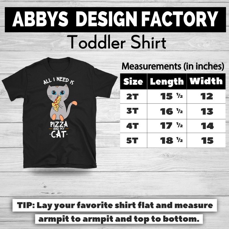 May include: Black toddler shirt with a graphic of a gray cat holding pizza and the text "ALL I NEED IS PIZZA AND MY CAT." Measurements are provided in inches for sizes 2T to 5T.