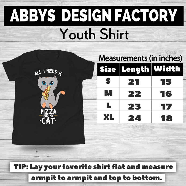 May include: Black youth shirt with a graphic of a gray cat holding pizza and the text "ALL I NEED IS PIZZA AND MY CAT." Measurements are provided in inches: S (21" length, 15" width), M (22" length, 16" width), L (23" length, 17" width), XL (24" length, 18" width).