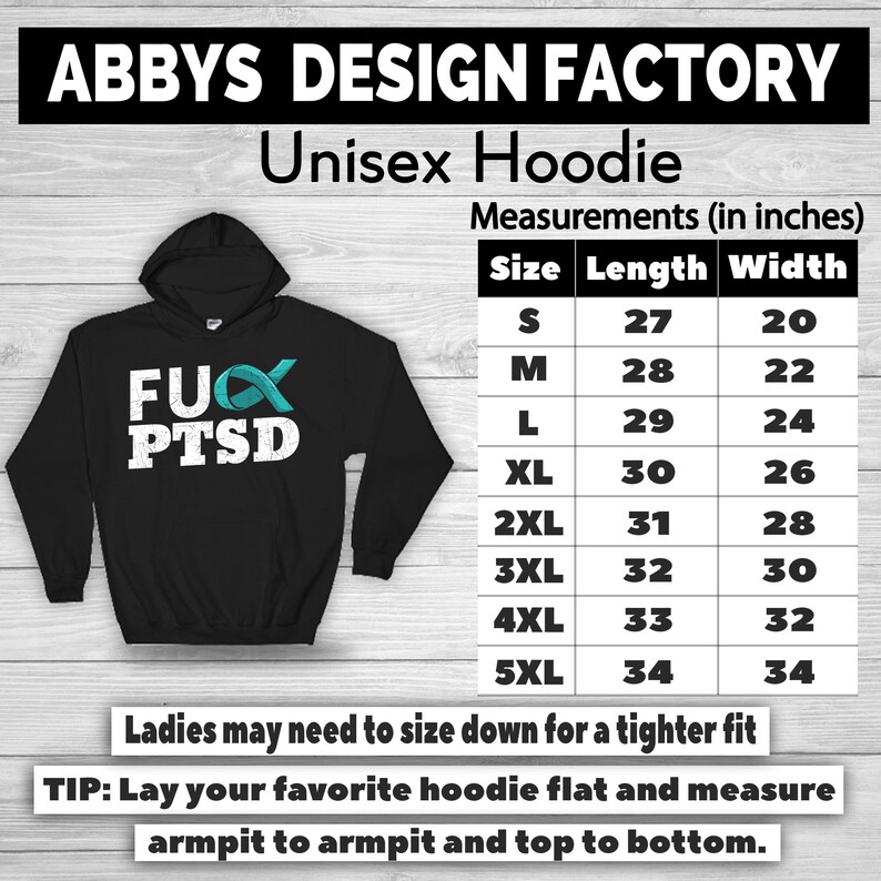 May include: Black unisex hoodie with the text "FUX PTSD" in white, with a teal ribbon graphic. The hoodie has a hood and measurements in inches are provided for each size, ranging from 27 inches in length to 34 inches.
