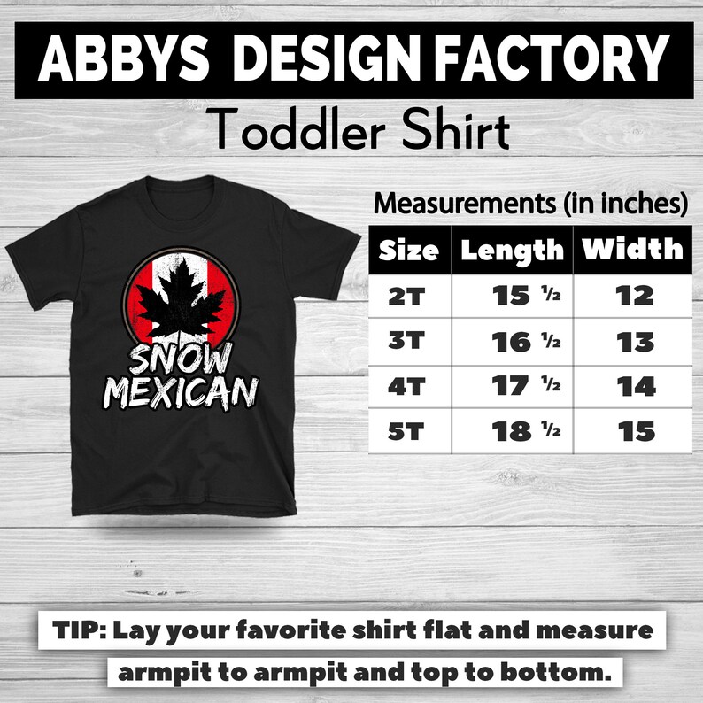 Pode incluir: Camiseta preta para crian&ccedil;a com um gr&aacute;fico de folha de bordo dentro de um c&iacute;rculo vermelho e branco, com o texto "SNOW MEXICAN". Medidas em polegadas para tamanhos 2T a 5T.