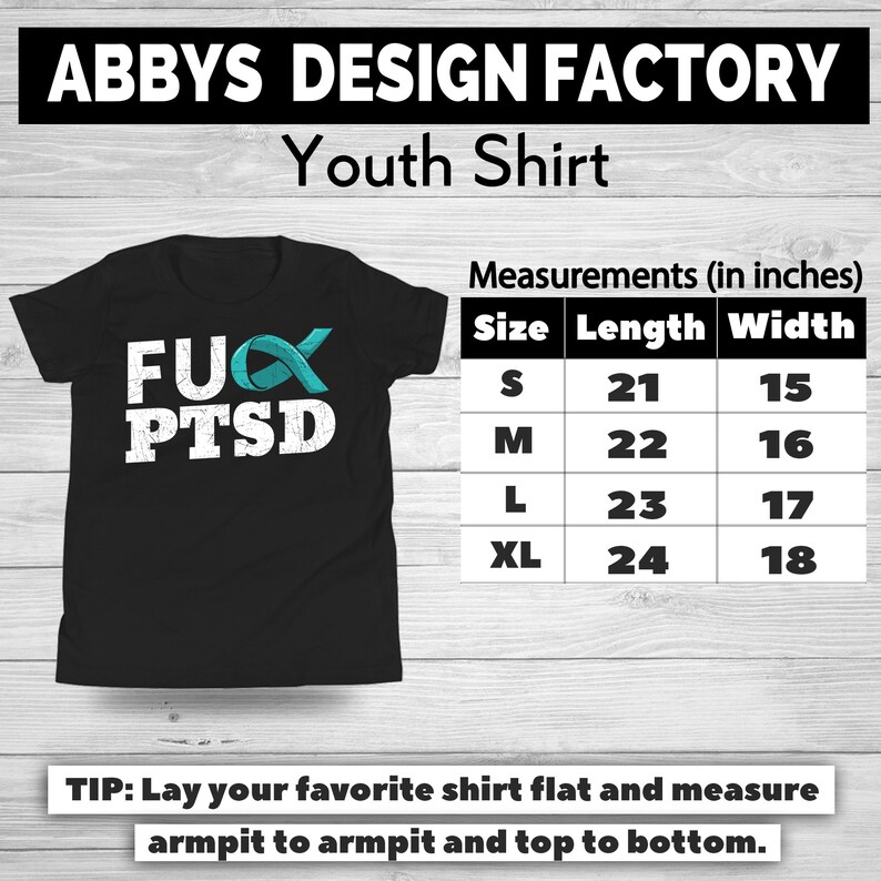 May include: Black youth shirt with the text "FUX PTSD" in white, with a teal ribbon graphic. Measurements are provided in inches: Size S (21" length, 15" width), M (22" x 16"), L (23" x 17"), and XL (24" x 18").