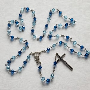 Sapphire Colored Swarovski Crystal Catholic Rosary with a Cut Out Miraculous Medal Centerpiece