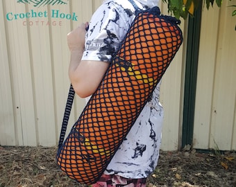 Yoga Mat Bag, Net Mesh Bag, fits a standard size yoga mat, crocheted in dark blue cotton yarn