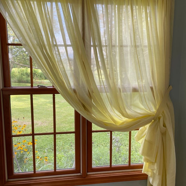 Vintage 1970’s sheer curtains in Creamy white 70”x86” (2) OR Pale yellow 168”x82 (1) and one valance 72” wide by 11.5” long & tiebacks (4)