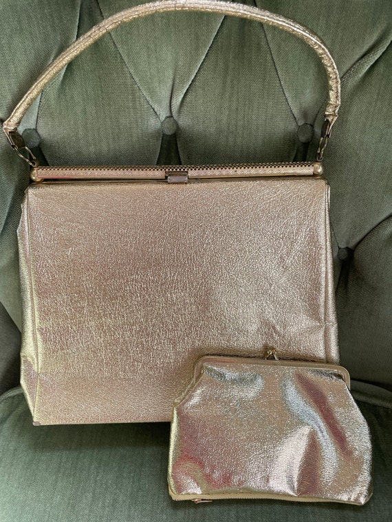 Vintage 1960’s mcm purse in gold metallic with coi