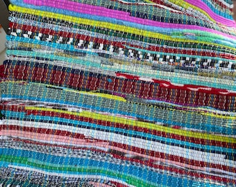 Handmade Rag Rug vibrant colors 36” or 40” Woven.  Boost your mood w/ this scrappy rag rug Machine washable! “Bohemian Rugsody”