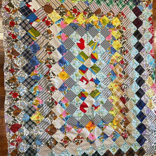 Vintage 1960’s quilt top 60”x74” diagonal squares scrappy patchwork pattern Eye candy for vintage fabric lovers! Hand sewn Use as tablecloth