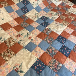 Beautiful Quilt made from Vintage 1990’s fabrics in Terra cotta and blues 83”x94” full/queen size hand quilted old fashioned quilt