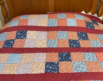Beautiful scrappy patchwork quilt with lots of coral colors Mom hand quilted this queen size in vintage patterned & calico fabrics 91”x86”