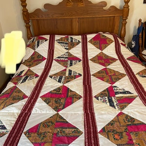 Quilt Full/Queen size hand quilted and set with points. Fuchsia vintage fabric hotpink diamonds with floral calicos, white & cream 89”x 82”