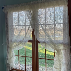 Pretty Vintage Lace Priscilla curtains in a beautiful ivory netted floral lace fabric with valance. Left & right panel 58”x61” all one piece