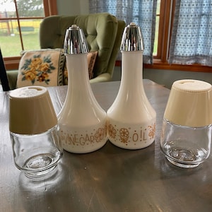 Vintage 1970s gemco shakers,  Vinegar & Oil Cruets harvest gold 7&quot; on white. Glass canisters or Lemon reamer Salt or use forcoffee spice set
