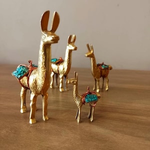 Peruvian Llama Figurine Set of 4 – Handcrafted Solid Bronze Llamas with Copper Backpack & Turquoise Stones – Andean Decor