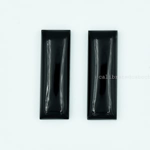 Par de cabujones de ónix negro: gema rectangular alargada, 10 x 20-10 x 30 mm
