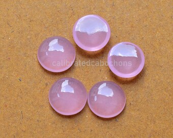 Cabochon calcédoine rose : dos plat rond, poli à la main (8-20 mm)
