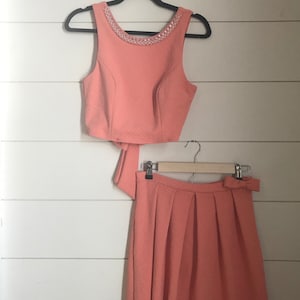 Matching Pink Skirt Set - size S/M women's peachy pink textured matching set with high, beaded neck, box pleat skirt, bow back, bow detail