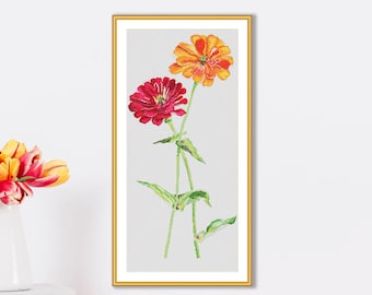 Könnte beinhalten: Ein gerahmtes Aquarellbild von zwei Zinnien, eine orange und eine rote, mit grünen Stielen und Blättern auf grauem Hintergrund.