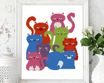 May include: A colorful cross-stitch pattern featuring a group of nine cats in various poses. The cats are all different colors, including red, blue, green, pink, and purple. The background is white.