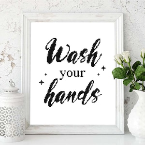May include: Black and white framed print with the text "Wash your hands" in a cursive font.