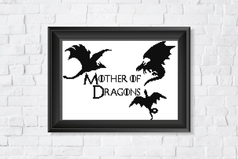 May include: Black and white image of three dragons with the text "Mother of Dragons" in the centre.