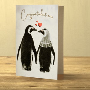 Biglietto MATRIMONIO PINGUINO: GRANDE formato A5. Una romantica coppia di pinguini si tiene per mano in questo biglietto da sposa carino ma lussuoso. "Sii il mio pinguino".