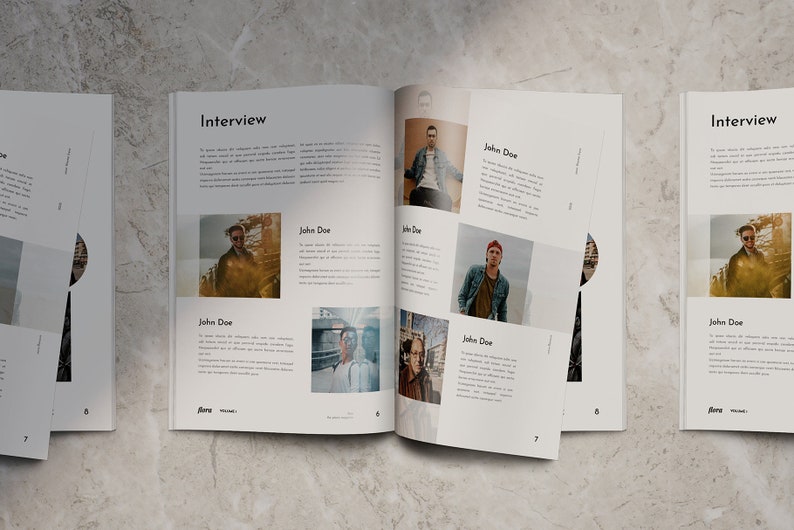May include: An open magazine with the word "Interview" on the cover. The magazine features photos of people and text about John Doe.