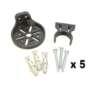May include: A black plastic wall mount with a circular design and a clip. The mount comes with three white plastic anchors and five silver screws. x 5