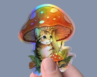 Smol Cat Under a Mushroom sticker, holographic vinyl, matte sticker, decal sticker for laptops, cars, hydroflask, toolbox, waterproof