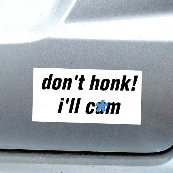 Car bumper sticker: "don't honk! i'll c*m"