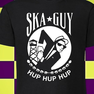 May include: Black t-shirt with a white graphic of a ska musician with the text "Ska Guy" and "Hup Hup Hup" printed on it.