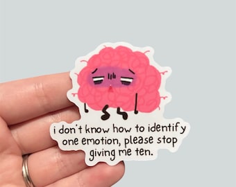Könnte beinhalten: Ein rosa Gehirn-Cartoon-Charakter mit einem traurigen Ausdruck und dem Text "Ich weiß nicht, wie ich eine Emotion identifizieren soll, bitte hör auf, mir zehn zu geben."