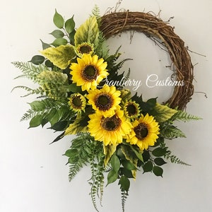 Ghirlanda di girasoli. Elegante ghirlanda di girasoli. Ghirlanda estiva di girasoli. Ghirlanda primaverile di girasoli. Ghirlanda estiva. Ghirlanda primaverile. Ghirlande. Decorazioni.
