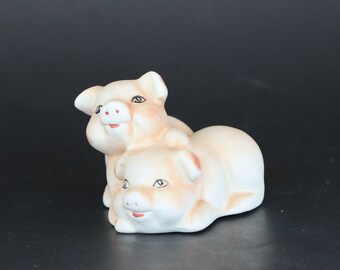 Statuetta vintage con coppia di maialini rosa: decorazione con animali da fattoria