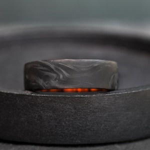 Unique Carbon Fiber Engagement Ring: A one-of-a-kind declaration of love.