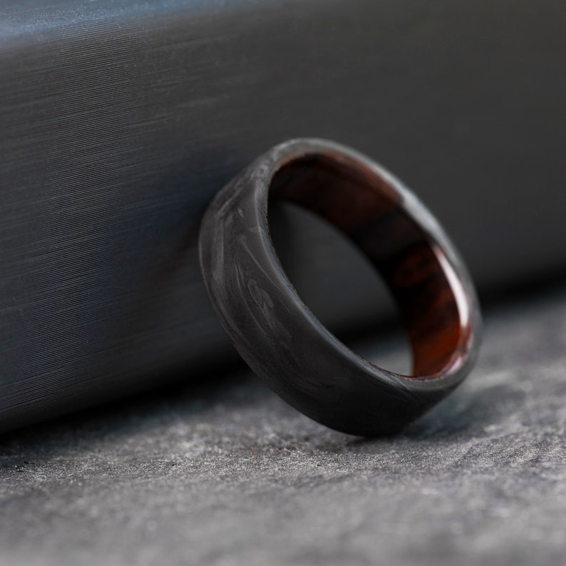 Ironwood and Carbon Fiber Wedding Band: A blend of rustic and modern.