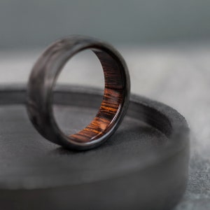 Forged Carbon Fiber Wedding Band: A modern symbol of love and strength.