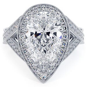 Pear Cut Moissanite Engagement Ring: Hidden Halo, Twisted Band