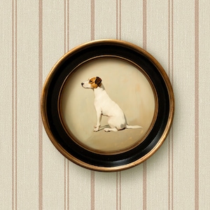 May include: A framed painting of a white and brown dog sitting in profile. The frame is black with a gold trim.