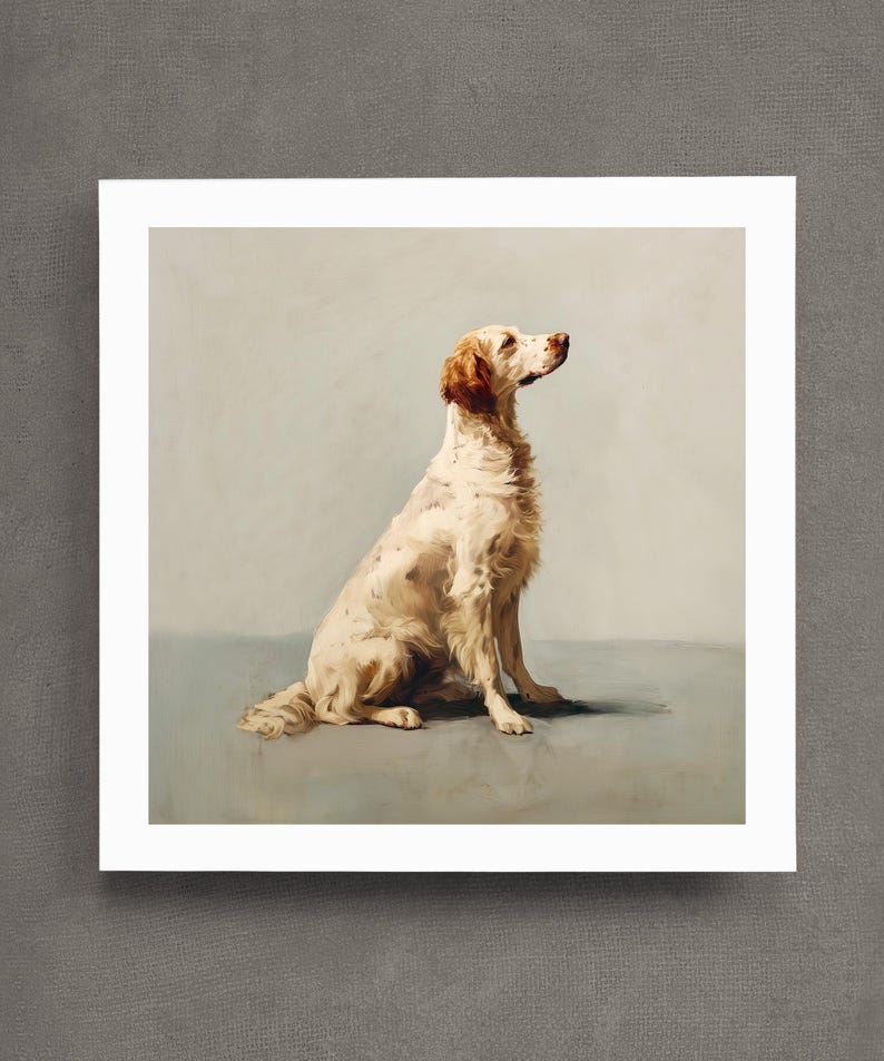 May include: A print of a dog, likely an English Setter, in a seated pose. The dog has a white coat with brown markings on its head and body. The artwork is set against a muted background, giving it a classic, vintage feel.