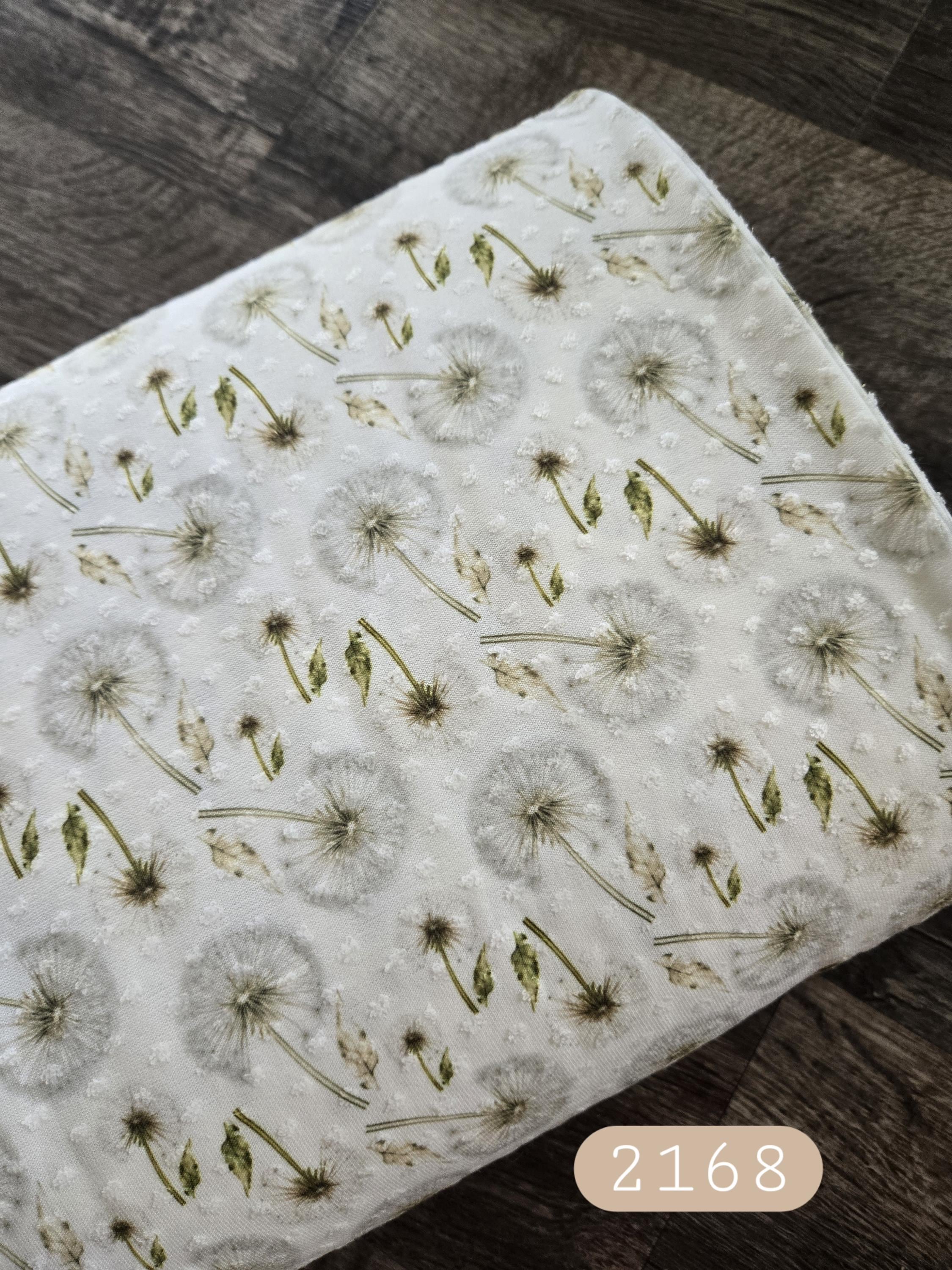 Floral in ivory Swiss dot knit fabric by the yard, knit fabric by the yard, ivory with green dandelions #2168